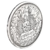 A silver-toned medallion depicting a seated Buddha figure with multiple arms and various ancient symbols.
