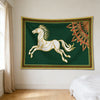 A tapestry wall hanging featuring a white horse silhouette on a dark green background with gold and red decorative borders.