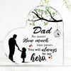 A clear acrylic heart-shaped plaque featuring a silhouette of a father and child, with text that reads Dad No matter how much
