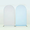 A pair of stretchable arch backdrop covers in white and light blue.