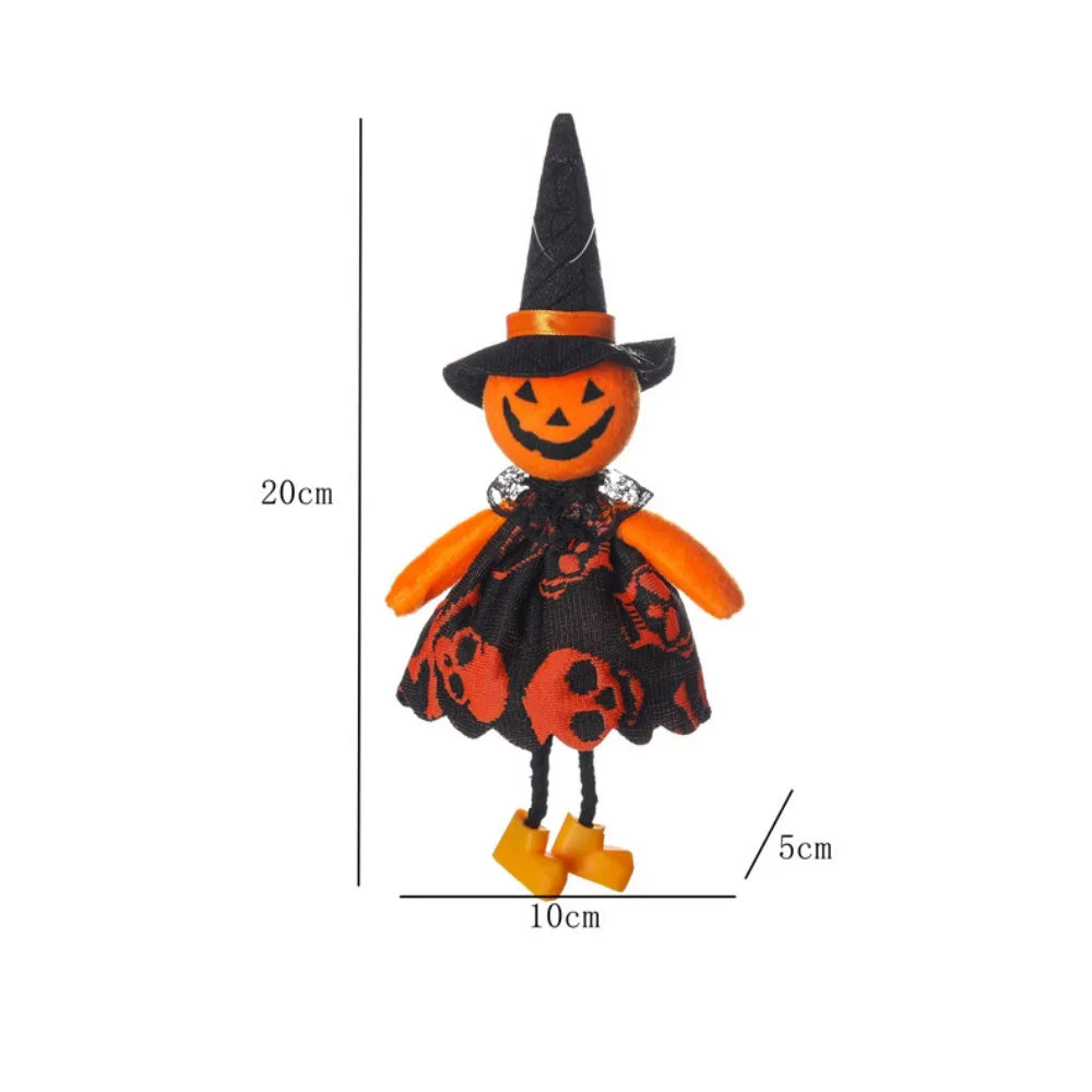 A black witch hat with an orange face and a black dress featuring orange accents and yellow boots.