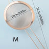 A round stainless steel colander with a 10cm diameter and a handle, shown against a light blue background.