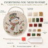 A DIY kit for diamond painting featuring a snowman design, including acrylic board, beads, and an applicator pen.