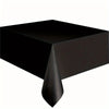 A black disposable solid color tablecloth draped over a table.