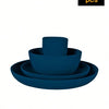 A set of four dark blue reusable plastic tableware items including a bowl and three plates.