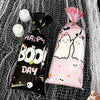 Black and pink Halloween candy treat bags featuring a little ghost or boo design