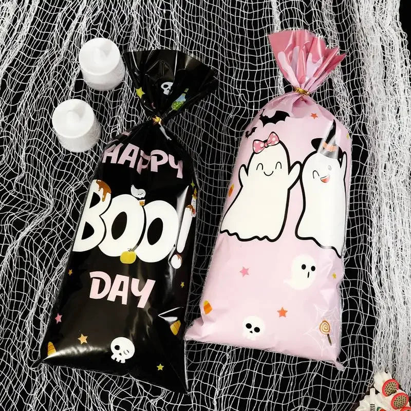Black and pink Halloween candy treat bags featuring a little ghost or boo design