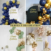A collection of blue and gold balloons and acrylic wall stickers used for birthday party decoration.