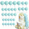 A set of light blue foam cake toppers on sticks, arranged in various sizes and shapes.