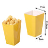 A yellow disposable paper cup filled with light brown popcorn.