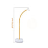 A gold-colored balloon arch kit with a stand, featuring a curved arch and a white base.