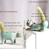 A ceramic feline planter with a textured green plant inside, shown next to its dimensions.
