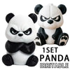 A white and black panda figurine with an angry expression sitting on a surface.