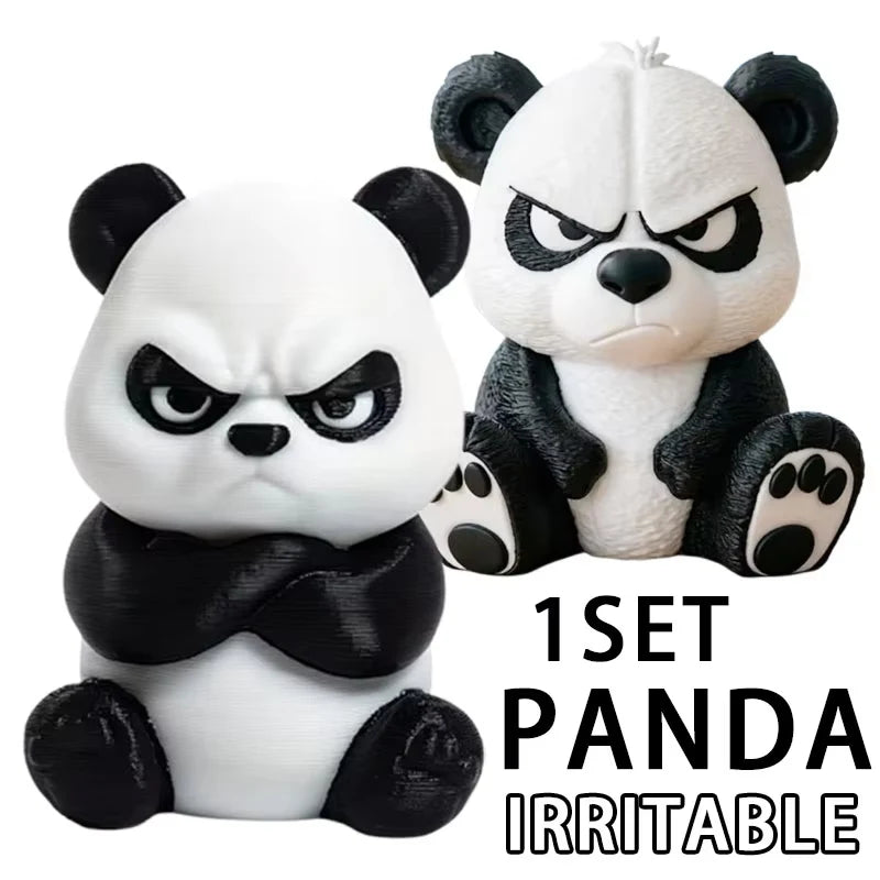 A white and black panda figurine with an angry expression sitting on a surface.