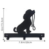 Black silhouette of a dog head and neck attached to a wooden key hook board