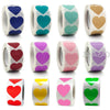 A collection of heart-shaped seal stickers in various pastel and vibrant colors for crafting and packaging.