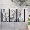 Three minimalist line art prints of a bottle, a glass, and a cup on a gray concrete wall.