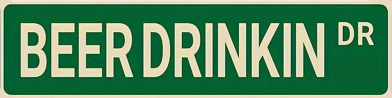A vintage green metal sign with white text that reads BEER DRINKIN DR