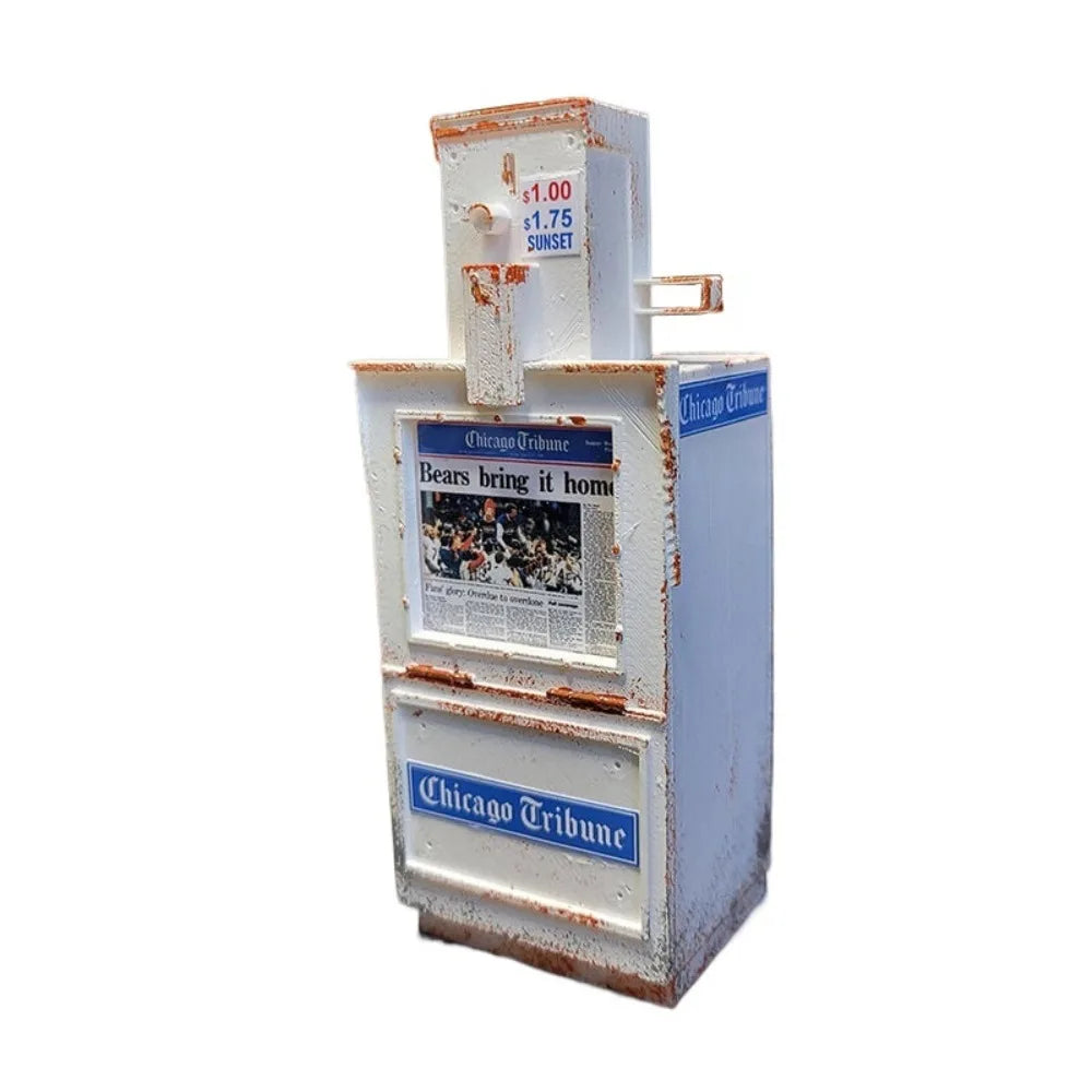 A vintage-style miniature payphone replica with distressed white and red paint, featuring Chicago Tribune branding.