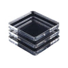 A stack of clear acrylic fridge magnet molds with square and rectangular shapes.