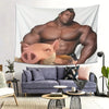 A tapestry featuring a muscular man and a pig head, displayed on a wall.