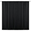 Black pleated drapery backdrop used for weddings and parties
