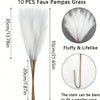 Ten artificial pampas grass stems, 35cm long, used for home decor.