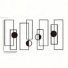 A set of five vertical metal wall decor pieces in black with various geometric shapes.