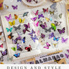 A spread of butterfly art collage stickers and illustrations for scrapbooking on a page.