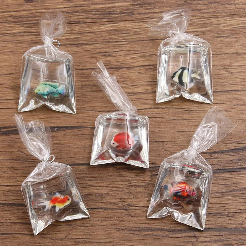 Colección de imanes de resina transparente con forma de peces payaso y otra vida marina, atados con cuerda para hacer joyería