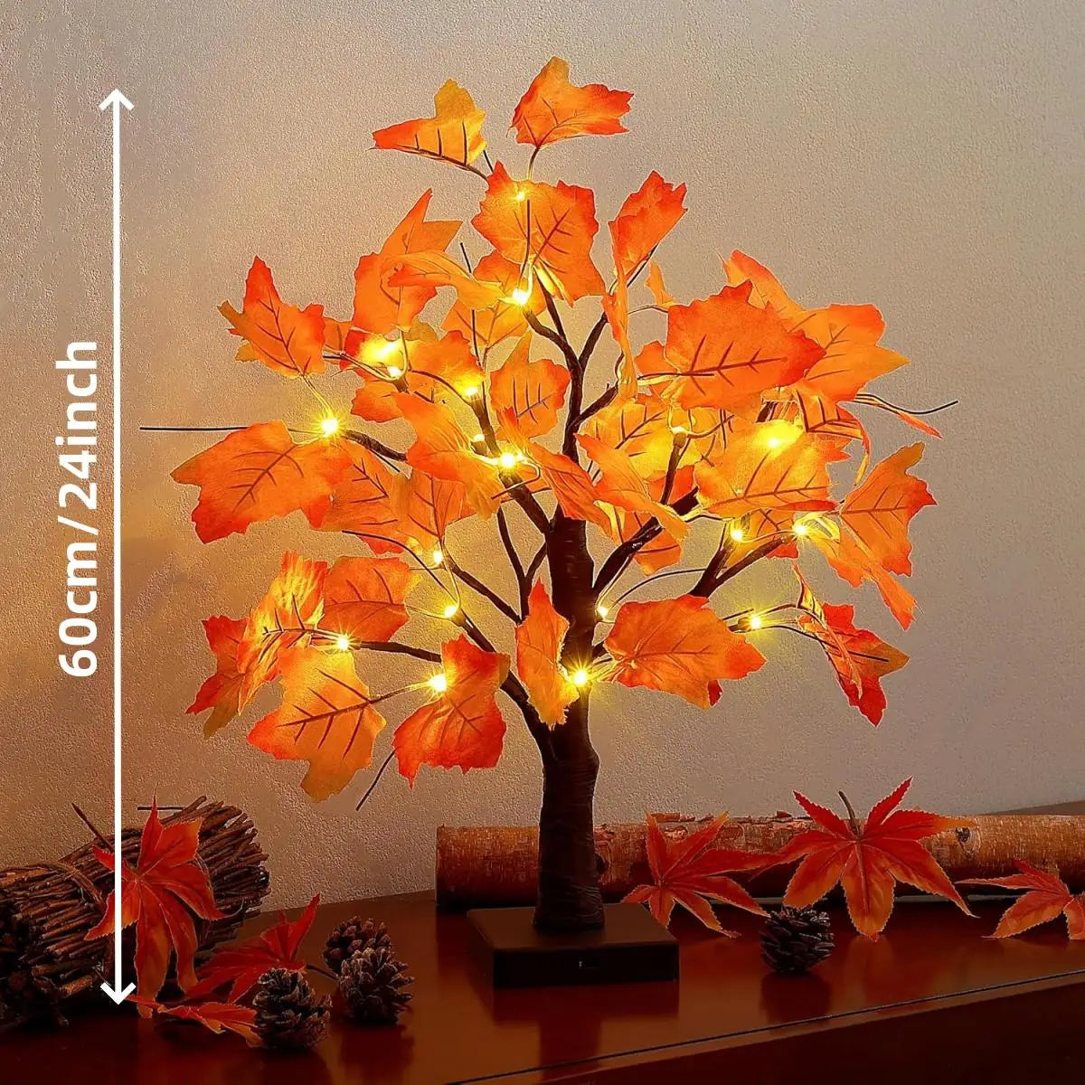 Un arbre de bouleau noir artificiel avec des feuilles d'automne orange vif illuminées par des lumières LED.