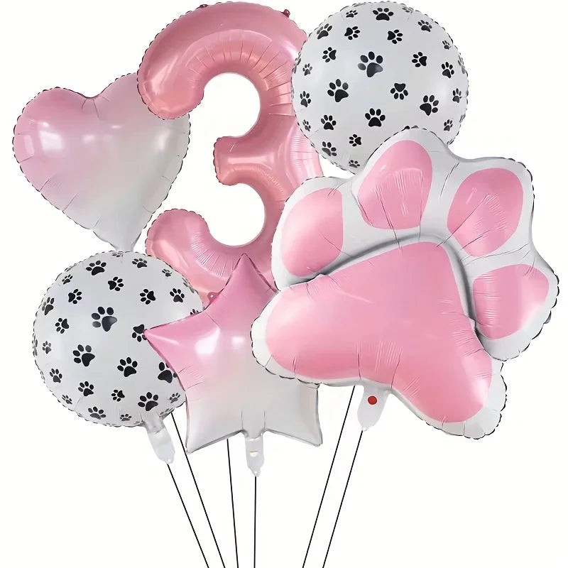 A foil balloon set featuring the number three, a heart, and a paw print shape in pink and white.