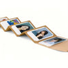 A set of five accordion folding photo albums with neutral brown covers displaying various photographs.