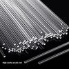 A close-up view of a set of clear acrylic rods or sticks arranged diagonally against a black background.
