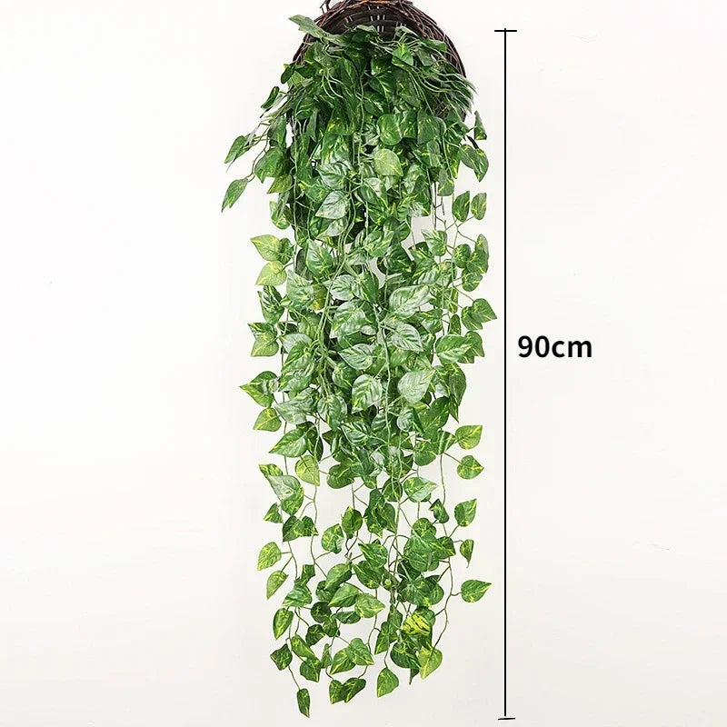 A long, cascading garland of green artificial ivy vine with a 90cm length for indoor and outdoor decoration.