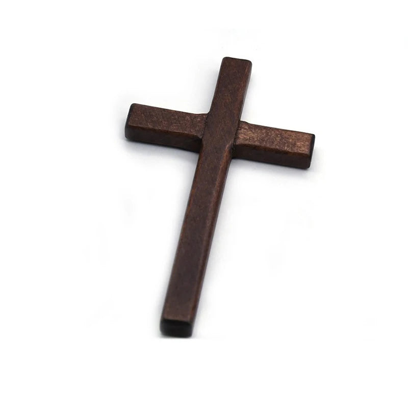 A handcrafted wooden wall cross with a two-tone finish, shown against a white background.