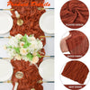 Terracotta semi-sheer cheesecloth table runner set featuring pleated fabric and neat edges.