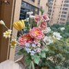 Handmade crochet flower bouquet featuring pink, yellow, and white peony, tulip, and rose decorations