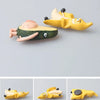 A set of cute 3D fridge magnets featuring a banana and an avocado fruit design.