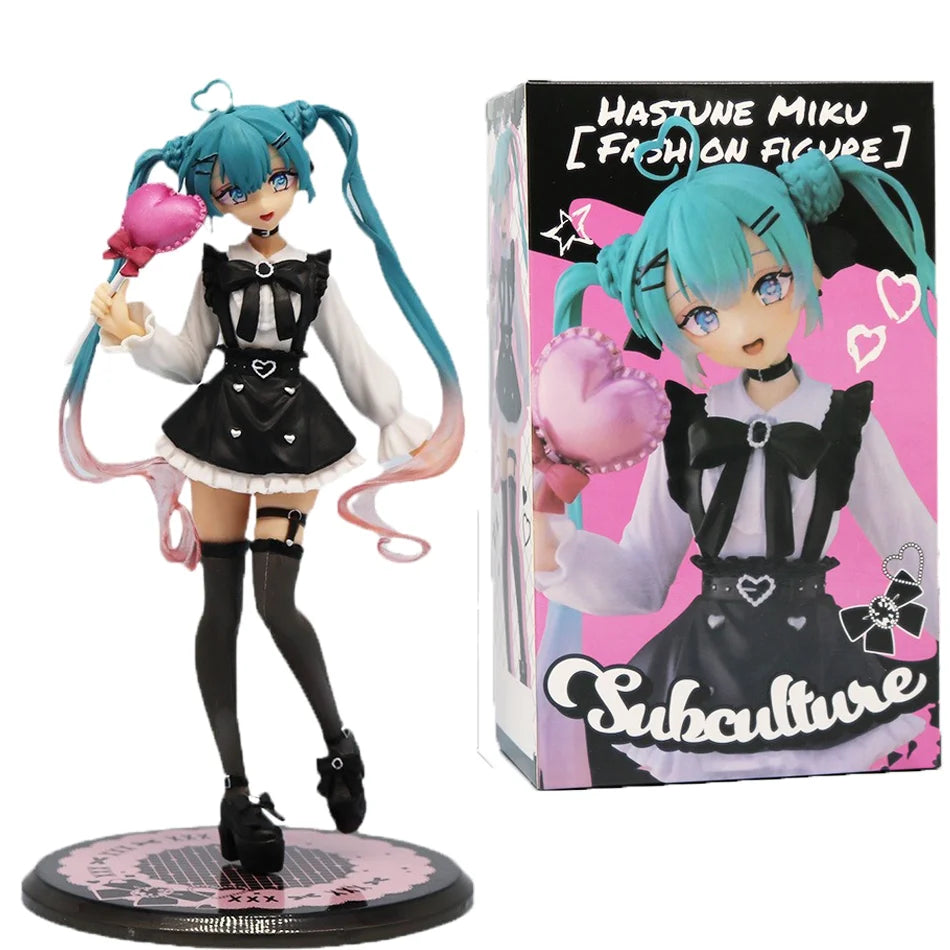 A PVC collectible figurine of Hatsune Miku with teal hair and a black dress and bow, holding a pink heart.