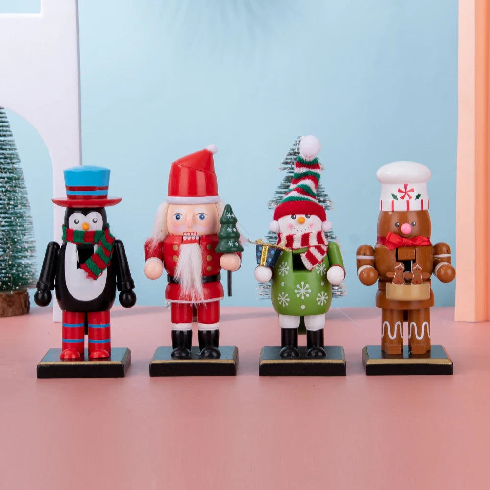 A row of four wooden nutcracker soldier ornaments in various colors and outfits standing on a pink surface.