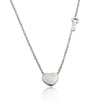 A silver titanium steel heart lock key pendant necklace displayed against a white background.