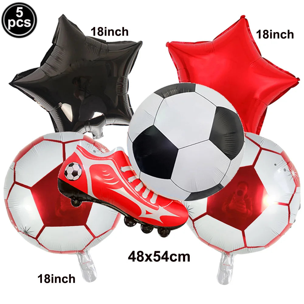 A set of five inflatable soccer balls and balloons in black, red, and white for a party decoration