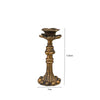 Vintage resin wall sconce candle holder with a fluted base and decorative leaves.