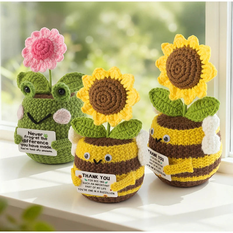Hand crocheted sunflower bee potted ornaments in green and yellow yarn