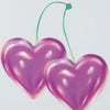 A pink heart-shaped canvas print featuring a swan and cherries, with a green string attached.