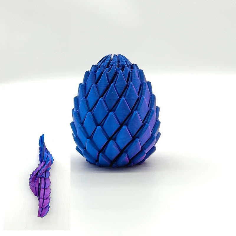 A close-up view of a 3D printed dragon egg fidget toy in vibrant blue and purple.