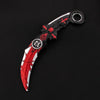 An anime-style rotating claw knife model featuring red and silver accents with a dragon motif.