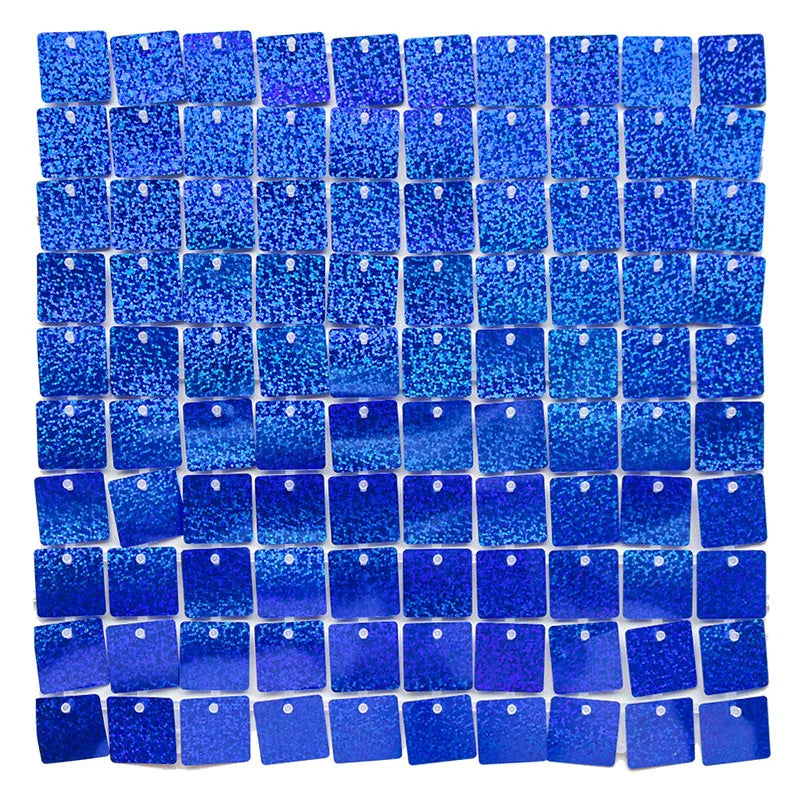 A grid of iridescent blue sequin shimmer wall panels used as a sparkling backdrop for celebrations.