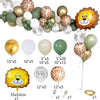 A collection of safari jungle birthday balloons including gold, green, and patterned balls.